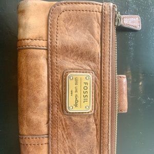 Beautifully worn Fossil wallet.